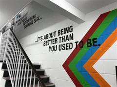 Gym wall lettering